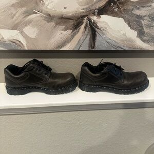 Dr. Martens Black Oxfords with Sturdy Sole and Smooth Finish